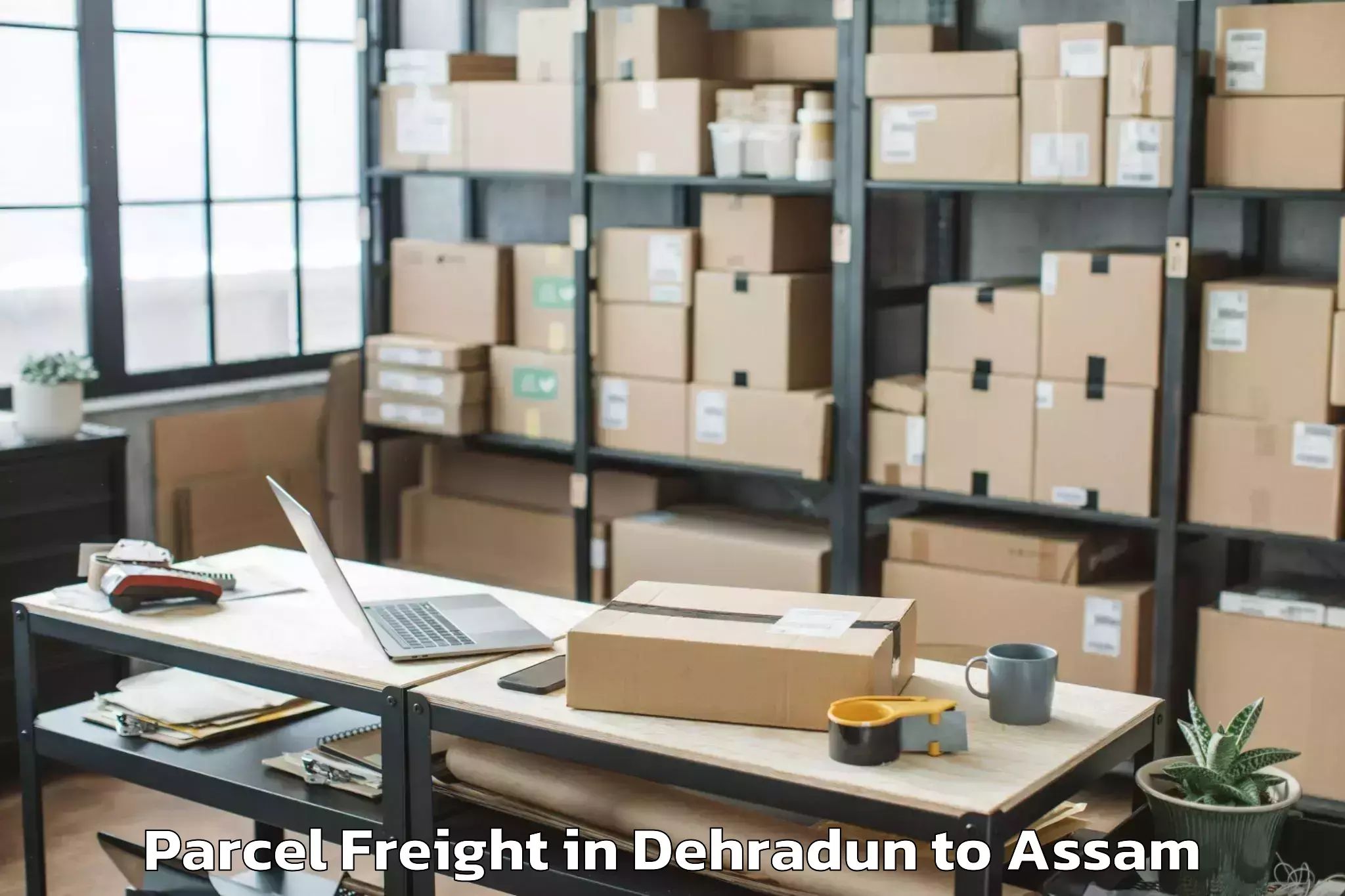 Book Your Dehradun to Bengtol Parcel Freight Today